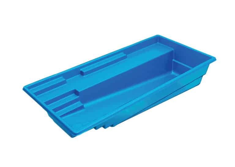 A blue plastic paint tray with a sloped side and compartments for holding tools, placed on a white background.