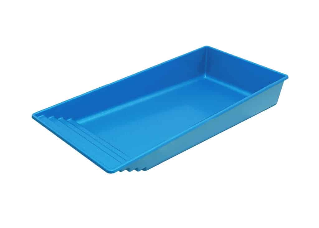 A blue plastic paint tray with a sloped design and ridges on one side for easy paint roller access.