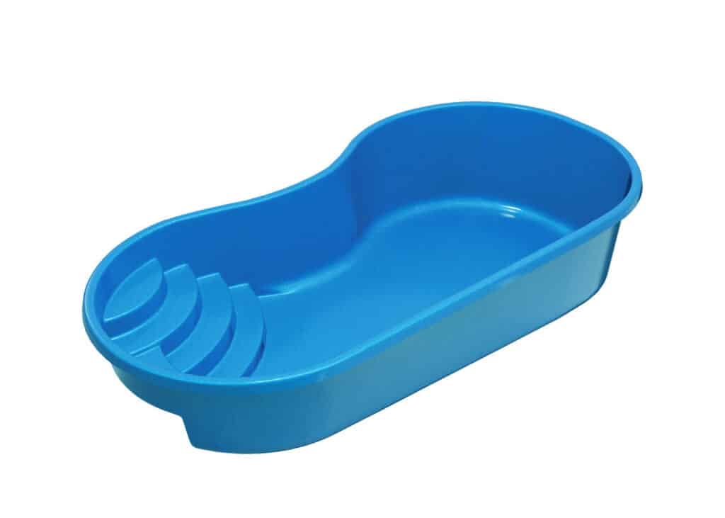 A blue plastic tray with a sleek, rounded design and four slotted sections on one side, positioned against a white background.